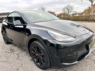 Tesla Model Y long range 75kwh aut - pano - leer - carbon - 360cam - stoelverw v+a - multimedia achter picture 4