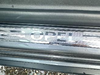 Opel Adam Cabrio 1.0 turbo 90pk 6-bak Rocks Online Ed - nap - clima - cruise - pdc v+a - 17 inch - side assist - elektr dak picture 63