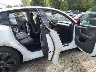 Tesla  Tesla MODEL Y RWD 58 kWh range 455km nwprijs € 45000 picture 7