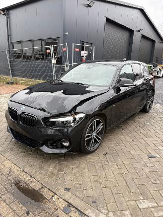 skadebil auto BMW 1-serie 118i 2018/4