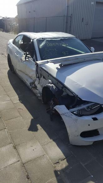 krockskadad bil bedrijf BMW E-NV200 E93  320i  cabrio 2011/1