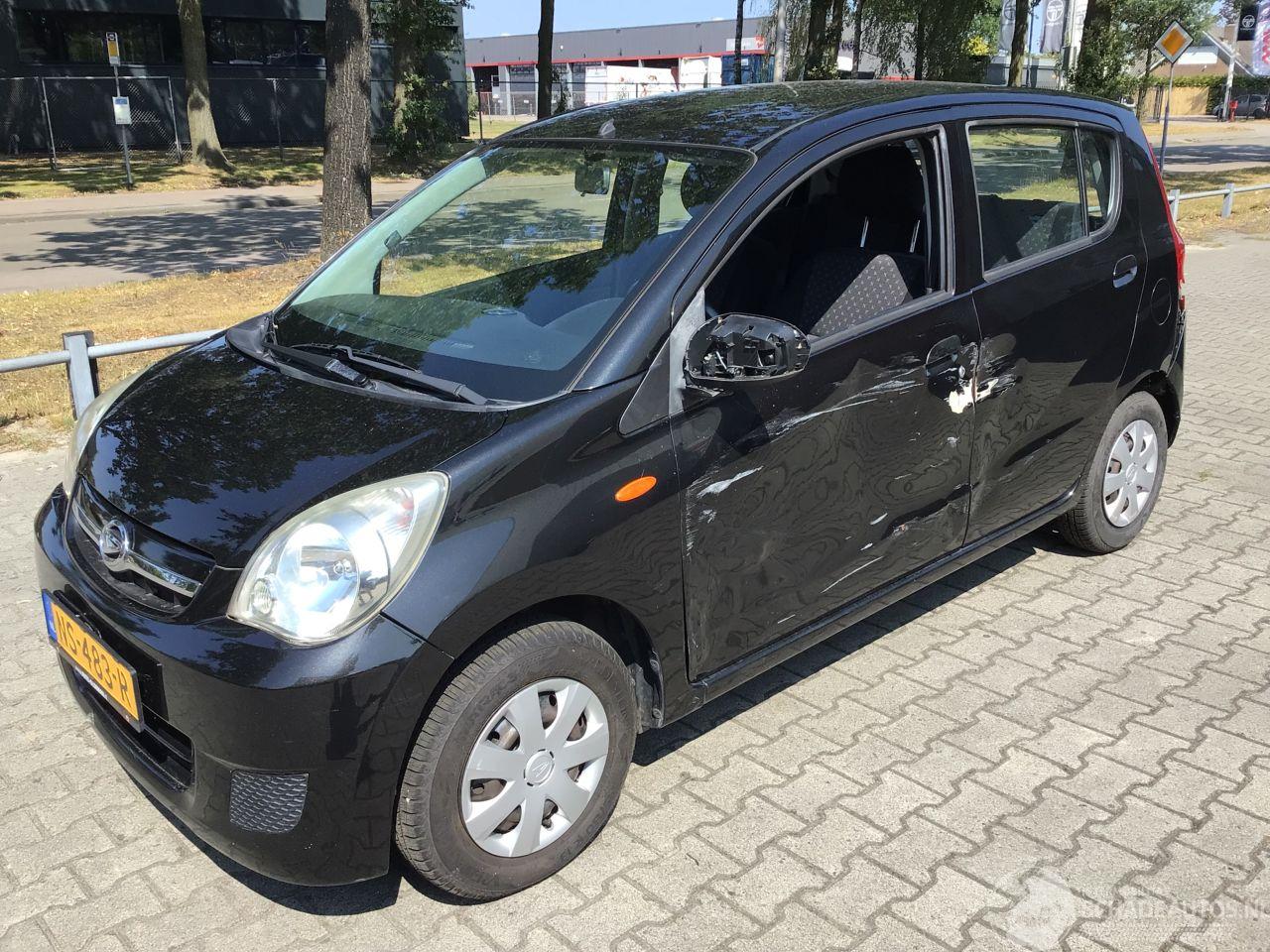 Daihatsu Cuore Cuore  1.0 trend AUTOMAAT lichte schade