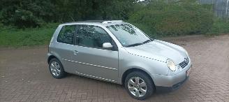 uszkodzony samochody osobowe Volkswagen Lupo Cambridge Edition 1.4-Mpi 1e eigenaar (1945) Elektrische ramen Schuifdak centrale vergrendeling Leren stuurwiel 14 inch Cambridge velgen 2003/2