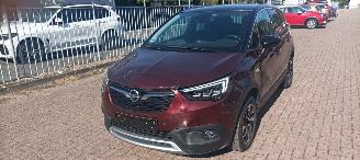 skadebil auto Opel Crossland Innovation uitvoering 1.2-Turbo Benzine Automaat Navigatie Climatecontrol CruiseControl Leren-Stuurwiel met verwarming Led-Koplampen Half-Leren bekleding Privacyglas afneembare trekhaak Metallic lak 2018/4