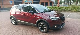 Vaurioauto  passenger cars Opel Crossland Innovation uitvoering 1.2 DI Turbo OPF Automaat Navigatie AppleCarPlay Climatecontrol CruiseControl Opel iLink Winterpakket Stoelverwarming stuurwielverwarming Voorruitverwarming Dimmende binnenspiegel Chrome-pakket Parkeersensoren Trekhaak Bi-Color Lak 2018/4