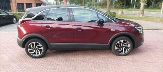 Opel Crossland Innovation uitvoering 1.2 DI Turbo OPF Automaat Navigatie AppleCarPlay Climatecontrol CruiseControl Opel iLink Winterpakket Stoelverwarming stuurwielverwarming Voorruitverwarming Dimmende binnenspiegel Chrome-pakket Parkeersensoren Trekhaak Bi-Color Lak picture 2