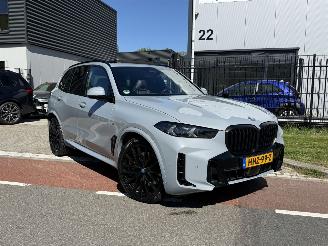 Vaurioauto  passenger cars BMW X5 xDrive50e HUD - SKYLOUNGE - IONIC GLOW - BOWERS&WILKINS 2024/2