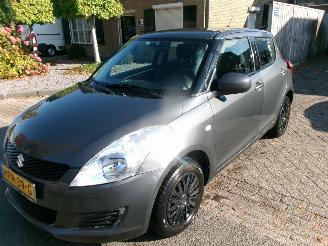 Coche accidentado Suzuki Swift 1.2 COMFORT 4X4 AIRCO 2012/6