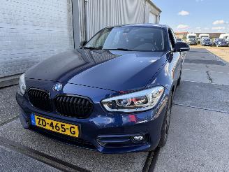 damaged passenger cars BMW 1-serie 118i Sport Line Automaat 2019/4