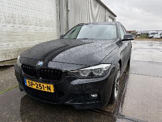 damaged passenger cars BMW 3-serie Touring 320i M-Sport Automaat 2018/5