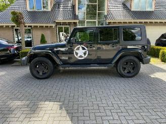 škoda osobní automobily Jeep Wrangler Unlimited 2.8 CRD SAHARA 2010/1