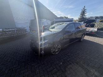 skadebil auto Toyota Auris Touring Sports 1.8 hybrid 2014/5