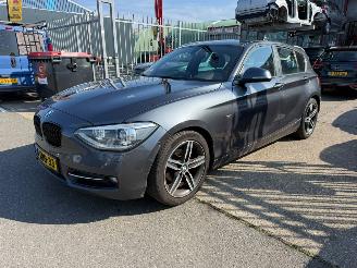 Voiture accidenté BMW 1-serie 116D EDE HIGH EXECUTIVE 2014/1
