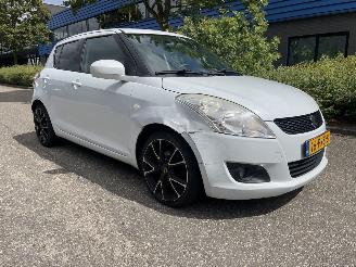skadebil auto Suzuki Swift 1.2 5drs clima 2011/5