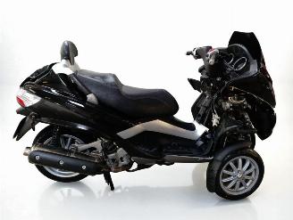 skadebil bromfiets Piaggio  MP3 2010/6