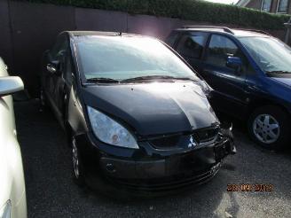 krockskadad bil auto Mitsubishi Colt 1.5 cabrio 2006/10